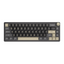 Compact mechanical keyboard with dark keycaps, beige highlights, and a metal volume knob