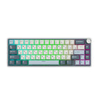 Compact mechanical keyboard with dark keycaps, beige highlights, and a metal volume knob