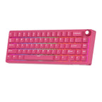 Compact mechanical keyboard with dark keycaps, beige highlights, and a metal volume knob