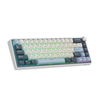 Compact mechanical keyboard with dark keycaps, beige highlights, and a metal volume knob