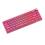 Compact mechanical keyboard with dark keycaps, beige highlights, and a metal volume knob