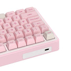 Pink and white mechanical gaming keyboard with rotary knob and compact layout