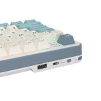 Mechanical gaming keyboard with digital display and yellow accents